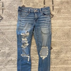 American Eagle Light Wash High Rise Distressed Skinny Jeans